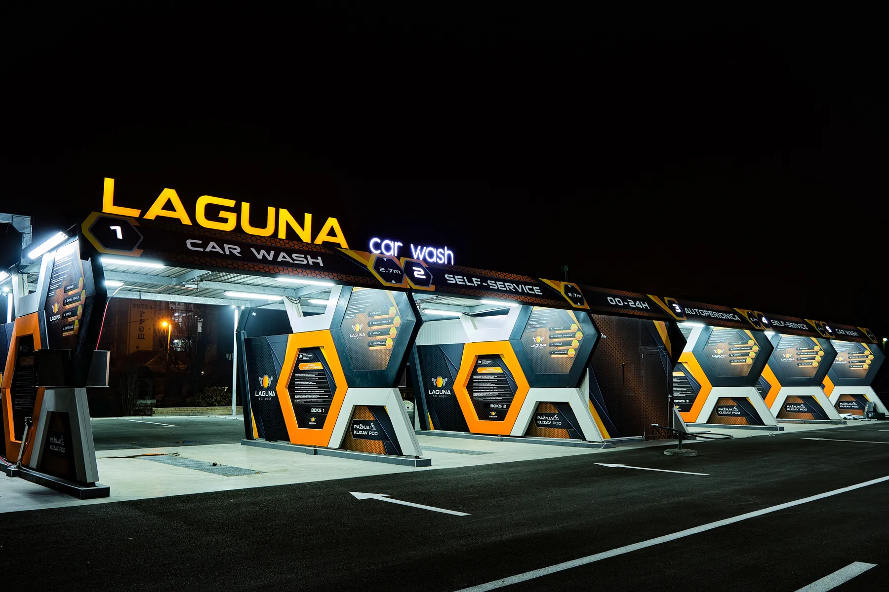 Laguna Car Wash - illuminated brand mark at night