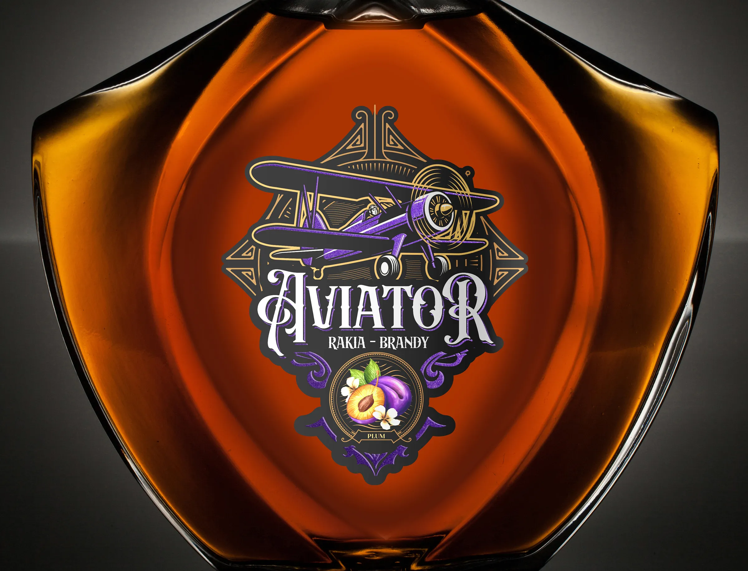 Aviator decanter close-up - biplane crest label